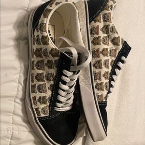 Vans is a pair of Vans Old Skool Jaguar black suede and canvas sneakers